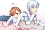  1boy 1girl accelerator ahoge albino book brown_eyes brown_hair eating food holding holding_food last_order lying makatani mouth_hold on_stomach open_mouth pillow pocky to_aru_majutsu_no_index white_hair 
