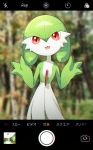  clothing dress fake_screenshot gardevoir green_body green_skin japanese_text looking_at_viewer lotosu nintendo not_furry pok&eacute;mon pok&eacute;mon_(species) red_eyes solo text tongue tongue_out video_games white_body white_skin 