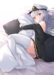  1girl artist_name azur_lane b_b_b_b66 bangs bare_shoulders black_skirt closed_mouth commentary dakimakura_(object) enterprise_(azur_lane) eyebrows_visible_through_hair hat jacket long_sleeves looking_at_viewer lying military_hat off_shoulder on_bed on_side panties pantyshot pantyshot_(lying) patreon_username peaked_cap pillow pillow_hug pleated_skirt purple_eyes sidelocks silver_hair skirt solo thighhighs underwear white_legwear younger 