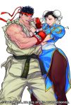  1boy 1girl artist_request belt black_belt black_hair blue_dress blue_eyes bracelet brown_eyes brown_hair brown_legwear bun_cover capcom china_dress chinese_clothes chun-li double_bun dougi dress eye_contact feeding fingerless_gloves food gloves headband hetero jewelry long_legs looking_at_another muscle official_art pantyhose pelvic_curtain pocky puffy_short_sleeves puffy_sleeves ryuu_(street_fighter) sash short_sleeves side_slit sleeveless spiked_bracelet spikes street_fighter street_fighter_v thick_eyebrows thick_thighs thighs 