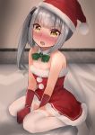  1girl bed_sheet black_ribbon blurry blurry_background blush commentary_request detached_collar fur_trim gloves green_ribbon grey_hair hair_ribbon hat highres kantai_collection kasumi_(kantai_collection) long_hair open_mouth pom_pom_(clothes) red_gloves ribbon santa_costume santa_hat sasakura_(calicchio) side_ponytail solo thighhighs white_legwear yellow_eyes 
