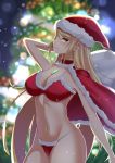  1girl absurdres alternate_costume arm_up bikini blonde_hair blurry blurry_background breasts cape christmas christmas_tree cleavage earrings gem hat highres hikari_(xenoblade_2) jewelry long_hair looking_at_viewer mebi_(mebieru) navel night one_eye_closed panties pose smile swimsuit teeth thighs tree underwear very_long_hair xenoblade_(series) xenoblade_2 yellow_eyes 