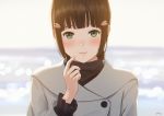  1girl alternate_costume bangs black_hair blunt_bangs blurry blurry_background blush casual closed_mouth commentary_request day depth_of_field double-breasted frilled_sleeves frills green_eyes grey_coat hair_ornament hairclip kurosawa_dia long_hair love_live! love_live!_sunshine!! mole mole_under_mouth outdoors papi_(papiron100) pink_lips pointing pointing_at_self smile solo sunlight upper_body 