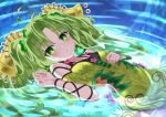  1girl ahoge bangs bare_shoulders blush breasts collarbone commentary_request cowboy_shot dress duel_monster eyebrows_visible_through_hair flower frown green_dress green_eyes green_hair hair_ornament hand_on_own_stomach jewelry lazupeace leaf long_hair looking_at_viewer lying_on_water parted_bangs ripples small_breasts solo traptrix_sera twintails very_long_hair water water_surface yuu-gi-ou 
