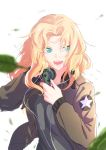  1girl absurdres blonde_hair blue_eyes blurry cowboy_shot depth_of_field girls_und_panzer headset highres jacket_on_shoulders kay_(girls_und_panzer) leaf long_hair open_mouth oze_(xyz_go_go11) saunders_military_uniform solo upper_body v-shaped_eyebrows white_background wind wind_lift 