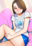  1girl aurahack blue_shorts breasts brown_eyes brown_hair chromatic_aberration commentary couch english_commentary hair_over_one_eye highres leg_hug looking_at_viewer on_couch original reclining shirt short_shorts shorts small_breasts solo t-shirt 