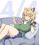  1girl animal_ear_fluff arknights blonde_hair blue_shorts blue_tail breasts cake camerata couch dated fang feet_out_of_frame food fork green_shirt happy_birthday highres holding holding_fork holding_phone large_breasts looking_at_viewer milk on_couch phone puffy_short_sleeves puffy_sleeves purple_eyes shirt short_hair short_sleeves shorts skin_fang solo thighs utage_(arknights) 