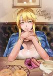  1girl absurdres ahoge artoria_pendragon_(all) artoria_pendragon_(lancer) blonde_hair bracelet breast_rest breasts chocolate collarbone commentary_request condom dated fate_(series) happy_valentine heart highres huge_ahoge jacket jewelry large_breasts long_hair looking_at_viewer love-saber pov_across_table smile solo upper_body valentine yellow_eyes 