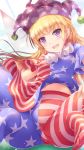  1girl american_flag_dress american_flag_legwear blonde_hair blue_background breasts clownpiece commentary_request fairy_wings hat highres jester_cap long_hair looking_at_viewer lzh midriff_peek navel neck_ruff no_shoes open_mouth pantyhose polka_dot purple_eyes purple_hair short_sleeves sitting small_breasts smile solo star star_print striped touhou wings 