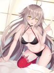  1girl ahoge bed bedroom bikini blush breasts dutch_angle fate/grand_order fate_(series) food highres jeanne_d&#039;arc_(alter_swimsuit_berserker) jeanne_d&#039;arc_(fate)_(all) kirisameaoto large_breasts long_hair looking_at_viewer navel o-ring o-ring_bikini open_mouth popsicle red_legwear silver_hair solo swimsuit very_long_hair yellow_eyes 