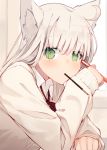 1girl animal_ears bow bowtie cardigan desk food food_in_mouth green_eyes highres holding holding_pencil indoors long_sleeves looking_at_viewer loose_neckwear mouth_hold nagishiro_mito original pencil platinum_blonde_hair pocky pullover red_neckwear red_ribbon ribbon sitting solo upper_body 