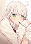  1girl bow bowtie cardigan desk food food_in_mouth green_eyes highres holding holding_pencil indoors long_sleeves looking_at_viewer loose_neckwear mouth_hold nagishiro_mito original pencil platinum_blonde_hair pocky pullover red_neckwear red_ribbon ribbon sitting solo upper_body 