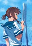  1girl blew_andwhite blouse blue_sailor_collar blue_sky bridge brown_hair cowboy_shot day from_behind fubuki_(kantai_collection) green_eyes highres jewelry kantai_collection outdoors ponytail sailor_collar school_uniform serafuku short_hair_with_long_locks short_sleeves sky solo third-party_edit tied_hair upper_body white_blouse 
