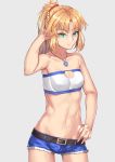  1girl arm_behind_head bandeau bangs bare_arms bare_shoulders belt black_belt blonde_hair blue_shorts braid breasts cleavage cleavage_cutout collarbone commentary cowboy_shot cutoffs eyebrows_visible_through_hair fate/apocrypha fate_(series) french_braid green_eyes grey_background groin hair_ornament hair_scrunchie hand_in_hair hand_on_hip hand_up jewelry long_hair looking_at_viewer midriff mordred_(fate) mordred_(fate)_(all) navel necklace ponytail red_scrunchie scrunchie short_shorts shorts sidelocks simple_background small_breasts solo standing stomach strapless tubetop wujiemang 