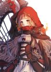  1girl arm_up bag bangs belt belt_buckle blonde_hair blunt_bangs blush bow brown_belt buckle cape chain closed_mouth dress fire hood hood_up hooded_cape little_red_riding_hood_(sinoalice) long_hair long_sleeves looking_at_viewer nozomiaisha red_bow red_cape red_hood simple_background sinoalice smile solo standing weapon white_background yellow_eyes 