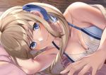  1girl blonde_hair blue_eyes breasts cleavage cucouroux_(granblue_fantasy) granblue_fantasy lying on_bed on_side panda_inu smile twintails under_covers 