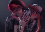  1boy 1girl banonefans baseball_cap blush cephalopod_eyes commentary couple domino_mask fangs full-face_blush hat inkling licking long_hair long_sleeves makeup mascara mask mohawk octarian octoling pointy_ears red_hair sexually_suggestive shirt short_hair splatoon_(series) splatoon_2 splatoon_2:_octo_expansion squidbeak_splatoon suction_cups t-shirt tentacle_hair 