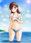  1girl absurdres bikini blue_bikini blue_sky blurry breasts brown_eyes brown_hair cleavage cloud commentary_request cowboy_shot day depth_of_field highres kantai_collection long_hair looking_at_viewer medium_breasts ocean ooi_(kantai_collection) outdoors sky skypixter soaking_feet solo standing striped_bikini_top sun swimsuit water 