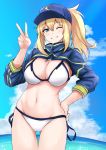  1girl ahoge artoria_pendragon_(all) baseball_cap bikini blonde_hair blue_eyes blue_headwear blue_jacket blue_sky blush breasts closed_mouth commentary_request cropped_jacket eyebrows_visible_through_hair fate/grand_order fate_(series) grin hair_between_eyes hair_through_headwear hand_on_hip hand_up hat highres jacket looking_at_viewer medium_breasts medium_hair midriff mysterious_heroine_xx_(foreigner) navel ocean one_eye_closed ponytail poshi_(ginmokusei) shrug_(clothing) side-tie_bikini sky smile solo swimsuit v white_bikini 