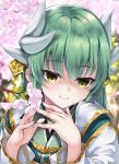 1girl bangs blurry blurry_background cherry_blossoms closed_mouth depth_of_field eyebrows_visible_through_hair fate/grand_order fate_(series) fingernails flower green_eyes green_hair green_kimono hair_ornament hands_up hitsujibane_shinobu horns japanese_clothes kimono kiyohime_(fate/grand_order) long_hair looking_at_viewer smile solo upper_body white_kimono 
