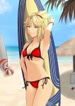 absurdres bangs beach belly bikini blonde_hair breasts fate/grand_order fate_(series) green_eyes hair_ornament hair_scrunchie highres looking_at_viewer mordred_(fate)_(all) mordred_(swimsuit_rider)_(fate) ponytail quatthro red_bikini scrunchie sidelocks small_breasts smile solo surfboard swimsuit 