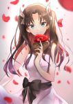  1girl bangs black_bow blurry_foreground bow brown_hair closed_mouth dress eyebrows_visible_through_hair fate/stay_night fate_(series) floating_hair flower gorogoronemuri gradient_hair green_eyes hair_bow hair_intakes highres holding holding_flower long_hair looking_at_viewer multicolored_hair petals red_flower red_hair shiny shiny_hair sleeveless sleeveless_dress smile solo standing toosaka_rin twintails very_long_hair white_bow white_dress 