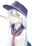  1girl absurdres anchor_symbol black_headwear black_sailor_collar black_skirt blue_eyes eyebrows_visible_through_hair flat_cap food food_in_mouth hair_between_eyes hat hibiki_(kantai_collection) highres kantai_collection long_hair long_sleeves neckerchief pleated_skirt popsicle red_neckwear sailor_collar school_uniform serafuku shaded_face silver_hair simple_background skirt solo tetuw white_background 