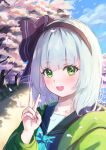  1girl alternate_costume black_hairband blue_sky blush cherry_blossoms clothing_request cloud commentary day falling_petals green_eyes hairband highres konpaku_youmu medium_hair narutakaya open_mouth outdoors petals pink_petals sky smile solo touhou tree v white_hair 