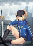  1girl ahoge artoria_pendragon_(all) baseball_cap black_footwear black_shorts blonde_hair blue_eyes blue_jacket blue_scarf boots breasts brick_wall commentary_request cross_(crossryou) fate/grand_order fate_(series) hair_between_eyes hair_through_headwear hat jacket long_hair looking_at_viewer mysterious_heroine_x ponytail scarf short_shorts shorts sitting small_breasts solo sword track_jacket weapon 