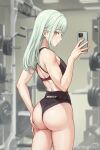 1girl ass bang_dream! bang_dream!_it&#039;s_mygo!!!!! bare_arms black_shorts black_sports_bra cellphone chinese_commentary closed_mouth commentary_request cowboy_shot da_akana_xiv expressionless from_behind green_hair gym highres holding holding_phone long_hair looking_at_viewer phone selfie short_shorts shorts smartphone solo sports_bra taking_picture twitter_username wakaba_mutsumi yellow_eyes 