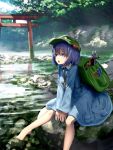  1girl backpack bag blue_dress blue_eyes blue_hair day dress green_headwear hair_between_eyes hair_bobbles hair_ornament hat highres kawashiro_nitori key on_rock open_mouth outdoors pliers reflection rock ryosios sitting sitting_on_rock solo tools torii touhou tree v_arms water wrench 