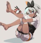  1girl absurdres bangs barefoot black_bodysuit black_gloves black_hairband blush bodysuit bodysuit_under_clothes bow breasts commentary_request dark_skin ear eyebrows_visible_through_hair gloves grey_background grey_hair gym_leader hair_between_eyes hairband highres holding holding_poke_ball knee_pads leg_hold legs_up looking_at_viewer masuo_(masdlivelove) orange_gloves poke_ball poke_ball_(generic) pokemon pokemon_(game) pokemon_swsh saitou_(pokemon) shadow shiny shiny_hair shiny_skin shirt shorts silver_eyes simple_background single_glove sitting soles solo toes two-tone_gloves white_shirt white_shorts wristband 