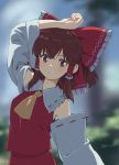  1girl arm_on_head arm_up ascot bangs blurry blurry_background blush bow brown_eyes brown_hair bush check_commentary closed_mouth commentary_request cowboy_shot detached_sleeves frilled_bow frilled_shirt_collar frills hair_between_eyes hair_bow hair_tubes hakurei_reimu hand_on_own_head highres large_bow leaning_back leaning_to_the_side long_sleeves looking_at_viewer medium_hair outdoors outstretched_arm red_bow red_shirt red_skirt ribbon ribbon-trimmed_collar ribbon-trimmed_sleeves ribbon_trim shiratama_(hockey) shirt sidelocks skirt skirt_set sleeveless sleeveless_shirt solo touhou traditional_media wide_sleeves yellow_neckwear yellow_ribbon 