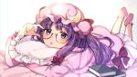 1girl bed_sheet book bow capelet crescent crescent_moon_pin dress glasses hair_bow hat highres long_hair looking_at_viewer lying mob_cap on_stomach parted_lips patchouli_knowledge pillow pink_capelet pink_dress pink_headwear pink_legwear purple_eyes purple_hair red_bow socks solo touhou vanilla_(miotanntann) 