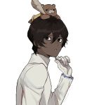 1boy arjuna_(fate/grand_order) bangs black_hair dark_skin dark_skinned_male fate/grand_order fate_(series) gloves hair_between_eyes hand_on_own_face long_sleeves looking_at_viewer male_focus multiple_boys on_head orion_(fate/grand_order) rozu_ki solo stuffed_animal stuffed_toy teddy_bear white_background white_gloves 