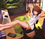  1girl arms_behind_back bangs bare_legs barefoot black_cat blunt_bangs book bookshelf brown_hair carpet cat cellphone chair commentary_request computer cup desk feet_out_of_frame fish_tank highres indoors laptop leaning_back legs legs_on_table looking_at_viewer medium_hair mug nintendo_switch office_chair orange_shorts original phone plant shadow shirt short_shorts shorts sidelocks sitting solo sorami_sachi sunlight t-shirt tabby_cat white_shirt yellow_eyes 