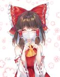  1girl bangs bare_shoulders blush bow brown_hair closed_eyes cowboy_shot detached_sleeves eyebrows_visible_through_hair facing_viewer floral_background frilled_bow frills hair_between_eyes hair_bow hair_tubes hakurei_reimu heart heart_hands highres large_bow long_hair long_sleeves mask mouth_mask red_bow ribbon-trimmed_sleeves ribbon_trim sidelocks solo symbol_commentary touhou upper_body urim_(paintur) white_background wide_sleeves yellow_neckwear 