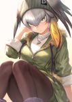  1girl alternate_costume bangs beanie bird_wings black_legwear blonde_hair blush casual coat eyebrows_visible_through_hair fur_trim green_coat green_eyes green_headwear grey_hair guchico hair_between_eyes hair_tie hat head_wings kemono_friends long_sleeves looking_at_viewer multicolored_hair pantyhose seashell_necklace shirt shoebill_(kemono_friends) short_hair solo turtleneck v-shaped_eyebrows white_shirt wings 