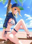  1girl absurdres ahoge artoria_pendragon_(all) bangs baseball_cap beach bikini blonde_hair blue_eyes blue_headwear blue_jacket blue_sky blush breasts cleavage cropped_jacket dousunnen fate/grand_order fate_(series) hair_between_eyes hair_through_headwear hat highres jacket knee_up large_breasts light_rays long_hair looking_at_viewer mysterious_heroine_xx_(foreigner) navel open_mouth palm_tree ponytail shrug_(clothing) sitting sky sunlight swimsuit thigh_strap tree wet white_bikini 