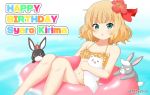  1girl afloat animal anko_(gochiusa) bangs bare_arms bare_shoulders bikini blonde_hair brown_bikini bunny character_name chestnut_mouth collarbone commentary_request crown eyebrows_visible_through_hair feet_out_of_frame flower gochuumon_wa_usagi_desu_ka? green_eyes hair_flower hair_ornament hair_ribbon happy_birthday innertube kirima_sharo knees_up looking_at_viewer miicha mini_crown navel parted_lips red_flower red_ribbon ribbon swimsuit tippy_(gochiusa) twitter_username water wild_geese 