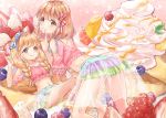  2girls :q alternate_hairstyle aoba_yukichi blonde_hair braid cream finger_to_mouth floral_background food frilled fruit futaba_anzu hair_ribbon idolmaster idolmaster_cinderella_girls kneeling matching_outfit midriff moroboshi_kirari multiple_girls navel orange_hair oversized_food pancake ribbon sitting strawberry tongue tongue_out twin_braids 