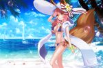  1girl animal_ear_fluff animal_ears bikini blue_bikini boat breasts cleavage commentary commentary_request ears_through_headwear eyebrows_visible_through_hair fate/grand_order fate_(series) flower fox_ears fox_girl fox_tail groin hair_flower hair_ornament hat highres large_breasts looking_at_viewer navel ocean outdoors palm_leaf palm_tree palms parasol pink_hair side-tie_bikini solo sun_hat swimsuit tail tamamo_(fate)_(all) tamamo_no_mae_(swimsuit_lancer)_(fate) tree uiu umbrella watercraft yellow_eyes 