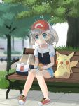  1girl 30re ayumi_(pokemon) backpack backpack_removed bag bangs baseball_cap bench blush can closed_mouth collarbone commentary_request day eyelashes gen_1_pokemon grass hat highres holding holding_can knees_together_feet_apart looking_at_viewer on_bench outdoors pigeon-toed pikachu pokemon pokemon_(creature) pokemon_(game) pokemon_lgpe short_sleeves sitting smile tile_floor tiles tree two-tone_headwear 