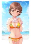  1girl beach bikini blue_sky blurry breasts brown_eyes brown_hair cleavage cloud commentary_request cowboy_shot day depth_of_field highres honda_mio idolmaster idolmaster_cinderella_girls lens_flare looking_at_viewer medium_breasts navel ocean orange_bikini outdoors shirt shirt_lift short_hair sky solo standing swimsuit tktk135 water white_shirt 