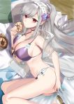  1girl azur_lane bare_legs blush braid breasts cleavage doughnut dunkerque_(azur_lane) dunkerque_(summer_sucre)_(azur_lane) eating eyebrows_visible_through_hair flower food grey_hair hair_flower hair_ornament hairband long_hair looking_at_viewer lying medium_breasts navel on_side ponytail purple_swimsuit red_eyes solo swimsuit thighs yam_(yam6056) 
