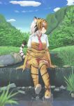  1girl :3 animal_ear_fluff animal_ears animal_print black_hair blue_sky boots cloud commentary day elbow_gloves full_body gloves grass hane_(kirschbaum) highres kemono_friends looking_to_the_side multicolored_hair nature necktie orange_hair outdoors print_gloves print_legwear red_neckwear river rock short_sleeves sky solo sumatran_tiger_(kemono_friends) tail thighhighs tiger_ears tiger_girl tiger_print tiger_tail water waterfall white_hair yellow_eyes 
