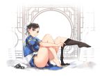  1girl amados artist_name black_hair black_legwear blue_skirt bracelet bracelet_removed breasts brown_eyes bun_cover china_dress chinese_clothes chun-li closed_mouth curtains double_bun dress dressing earrings from_side full_body highres jewelry knee_up large_breasts leg_up looking_at_viewer looking_to_the_side obi pantyhose pelvic_curtain puffy_short_sleeves puffy_sleeves ribbon sash short_hair short_sleeves sitting skirt solo spiked_bracelet spikes street_fighter white_ribbon 