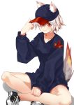  1girl alternate_costume animal_ear_fluff animal_ears black_headwear black_shirt collarbone contemporary gozenjuziame hat highres holding holding_clothes holding_hat inubashiri_momiji leaf looking_at_viewer maple_leaf no_pants no_socks red_eyes shirt shoes simple_background smile sneakers solo tail touhou white_background white_hair wolf_ears wolf_girl wolf_tail 
