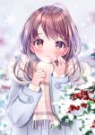  1girl berries blue_jacket blurry blurry_background blush brown_eyes brown_hair closed_mouth hand_on_own_cheek hands_up highres jacket leaf long_hair looking_at_viewer original outdoors plaid plaid_scarf plant scarf snow snowflakes snowing solo winter winter_clothes yugirlpict 