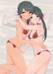  2girls alakoala bangs bikini black_hair breasts commentary_request cowboy_shot dated green_eyes highres kantai_collection long_hair looking_at_viewer lying mikuma_(kantai_collection) mogami_(kantai_collection) multiple_girls on_side pillow red_bikini short_hair side-tie_bikini signature small_breasts swept_bangs swimsuit twintails 